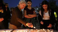 Violet Turgeman, of Ramat Gan, lights a candle, after the truce between Israel and Hamas started today, in Tel Aviv, Israel November 24, 2023. REUTERS/Nathan Frandino