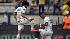Pumas' Cesar Huerta (L) celebrates with teammate Jose Luis Caicedo after scoring against Atletico San Luis during their Mexican Apertura 2023 tournament football match at the Olimpico Universitario stadium in Mexico City on September 17, 2023. (Photo by ALFREDO ESTRELLA / AFP)