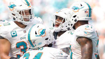 MIAMI GARDENS, FLORIDA - SEPTEMBER 24: De'Von Achane #28 of the Miami Dolphins celebrates after his touchdown during the fourth quarter against the Denver Broncos at Hard Rock Stadium on September 24, 2023 in Miami Gardens, Florida.   Carmen Mandato/Getty Images/AFP (Photo by Carmen Mandato / GETTY IMAGES NORTH AMERICA / Getty Images via AFP)