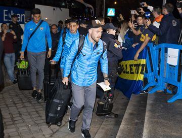 Boca players given a raucous welcome in Madrid