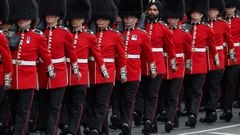 The King’s Guard uniform was not designed for aesthetics but for a practical function, and the hats form a major component.