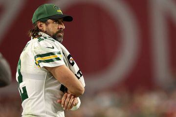 GLENDALE, ARIZONA - OCTOBER 28: Aaron Rodgers #12 of the Green Bay Packers watches action from the sideline during the second half of a game against the Arizona Cardinals at State Farm Stadium on October 28, 2021 in Glendale, Arizona.