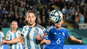 Argentina's midfielder #06 Aldana Cometti and Italy's midfielder #06 Manuela Giuglianoduring the Australia and New Zealand 2023 Women's World Cup Group G football match between Italy and Argentina at Eden Park in Auckland on July 24, 2023. (Photo by Saeed KHAN / AFP)