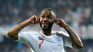 Raheem Sterling responds to abuse during an England game.