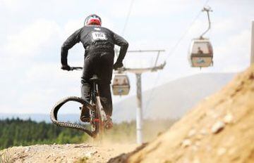 USA's Dakotah Norton loses his tyre during the World Cup mountain biking in Fort William, Scotland.