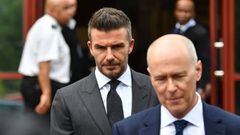 Former England international footballer David Beckham (C) leaves Bromley Magistrates Court in Bromley, south-east of London on May 9, 2019, after being disqualifeid from driving for six months for driving while using a mobile phone. (Photo by Daniel LEAL-