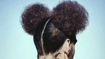 Fellaini changes hairstyle with a look of Mickey Mouse about it