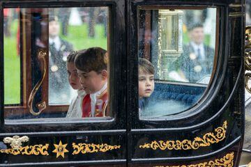 Princess Charlotte, Prince George and Prince Louis as the Coronation Procession leaves Westminster Abbey following the coronation ceremony of King Charles III and Queen Camilla in central London. Picture date: Saturday May 6, 2023.  Jane Barlow/Pool via REUTERS