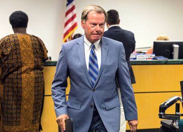 Golfer Tiger Woods' attorney, Douglas Duncan, leaves North Palm Beach County courthouse after filing paperwork in Woods' DUI case