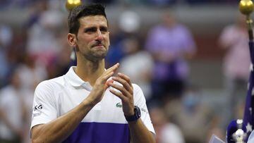 Serbia&#039;s Novak Djokovic applauds the crowd after losing to Russia&#039;s Daniil Medvedev during their 2021 US Open Tennis tournament men&#039;s final match at the USTA Billie Jean King National Tennis Center in New York, on September 12, 2021. (Photo