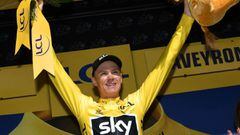 Great Britain&#039;s Christopher Froome celebrates his overall leader yellow jersey on the podium at the end of the 181,5 km fourteenth stage of the 104th edition of the Tour de France cycling race on July 15, 2017 between Blagnac and Rodez.