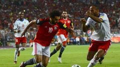 Egypt&#039;s Mohamed Salah vies for the ball against Congo&#039;s Tobias Badila during their World Cup 2018 Africa qualifying match between Egypt and Congo at the Borg el-Arab stadium in Alexandria on October 8, 2017.