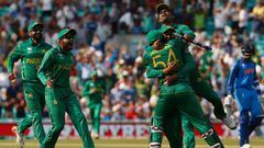 Pakistan&#039;s players celebrate their victory over India on the pitch after the ICC Champions Trophy final cricket match between India and Pakistan at The Oval in London on June 18, 2017. Pakistan thrashed title-holders India by 180 runs to win the Cha