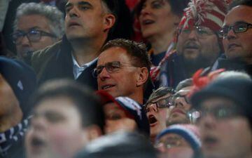 RB Leipzig's sports director Ralf Rangnick watches the match among Leipzig fans