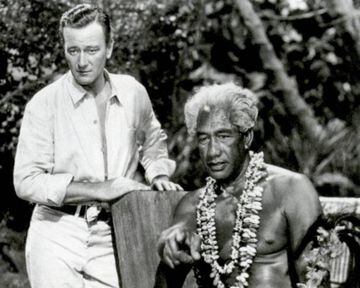 Duke Kahanamoku and John Wayne in the film "Wake of the Red Witch" in 1948.