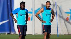 Los jugadores del FC Barcelona Franck Kessié y Aubameyang, durante el entrenamiento de hoy en la ciudad deportiva Joan Gamper.