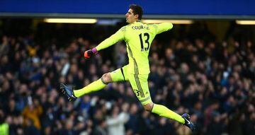 Courtois celebrates a Chelsea goal against Bournemouth in the Premier League.