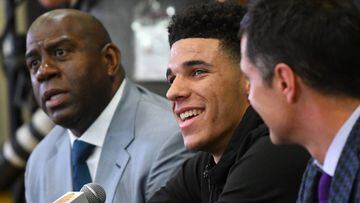 LOS ANGELES, CA - JUNE 23: Magic Johnson, president of basketball operations of the Los Angeles Lakers, general manager Rob Pelinka and draft pick Lonzo Ball talk to the media during a press conference on June 23, 2017 at the team training faculity in Los Angeles, California.   Jayne Kamin-Oncea/Getty Images/AFP == FOR NEWSPAPERS, INTERNET, TELCOS &amp; TELEVISION USE ONLY ==