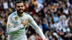 Real Madrid&#039;s Spanish defender Nacho Fernandez celebrates after scoring a goal during the Spanish league football match between Real Madrid and Sevilla at the Santiago Bernabeu Stadium in Madrid on December 9, 2017. / AFP PHOTO / PIERRE-PHILIPPE MARCOU