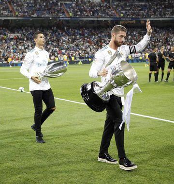Sergio Ramos and Cristiano Ronaldo couldn't play but picked up some trophies ahead of the Valencia game.