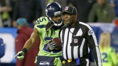 SEATTLE, WA - DECEMBER 15: Cornerback Richard Sherman #25 of the Seattle Seahawks talks with Line Judge Tom Symonette after a play against the Los Angeles Rams at CenturyLink Field on December 15, 2016 in Seattle, Washington.   Otto Greule Jr/Getty Images/AFP == FOR NEWSPAPERS, INTERNET, TELCOS &amp; TELEVISION USE ONLY ==