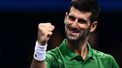 Serbia's Novak Djokovic celebrates after winning his first round-robin match against Greece's Stefanos Tsitsipas at the ATP Finals tennis tournament on November 14, 2022 in Turin. (Photo by Marco BERTORELLO / AFP) (Photo by MARCO BERTORELLO/AFP via Getty Images)