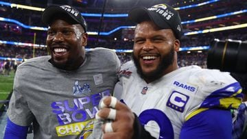 Los Angeles Rams outside linebacker Von Miller (left) and defensive end Aaron Donald celebrate after defeating the Cincinnati Bengals in Super Bowl LVI at SoFi Stadium.