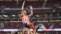 MADRID, SPAIN - MAY 12: Diego Godin of Atletico Madrid is thrown into the air by his teammates during celebrations after his last home match for the club  at the end of the La Liga match between  Club Atletico de Madrid and Sevilla FC at Wanda Metropolita