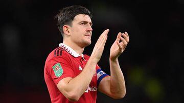 MANCHESTER, ENGLAND - NOVEMBER 10: Harry Maguire of Manchester United shows appreciation to fans following the Carabao Cup Third Round match between Manchester United and Aston Villa at Old Trafford on November 10, 2022 in Manchester, England. (Photo by Stu Forster/Getty Images)