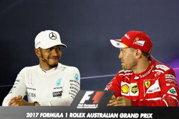 Race winner Sebastian Vettel (right) with second-placed Lewis Hamilton in the post-Grand Prix press conference.