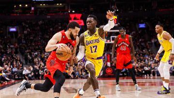TORONTO, ON - DECEMBER 07: Fred VanVleet #23 of the Toronto Raptors dribbles against Dennis Schroder #17 of the Los Angeles Lakers during the first half of their NBA game at Scotiabank Arena on December 7, 2022 in Toronto, Canada. NOTE TO USER: User expressly acknowledges and agrees that, by downloading and or using this photograph, User is consenting to the terms and conditions of the Getty Images License Agreement.   Cole Burston/Getty Images/AFP (Photo by Cole Burston / GETTY IMAGES NORTH AMERICA / Getty Images via AFP)