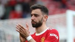 MANCHESTER, ENGLAND - APRIL 16: Bruno Fernandes of Manchester United applauds the fans after the Premier League match between Manchester United and Norwich City at Old Trafford on April 16, 2022 in Manchester, England. (Photo by Tom Purslow/Manchester United via Getty Images)