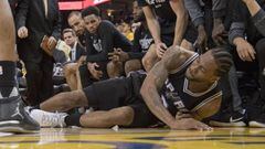 May 14, 2017; Oakland, CA, USA; San Antonio Spurs forward Kawhi Leonard (2) reacts after an injury during the third quarter in game one of the Western conference finals of the 2017 NBA Playoffs against the Golden State Warriors at Oracle Arena. The Warriors defeated the Spurs 113-111. Mandatory Credit: Kyle Terada-USA TODAY Sports