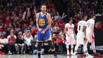 Apr 22, 2017; Portland, OR, USA; Golden State Warriors guard Stephen Curry (30) celebrates after the Warriors score on the Portland Trail Blazers in game three of the first round of the 2017 NBA Playoffs at Moda Center. Mandatory Credit: Jaime Valdez-USA 