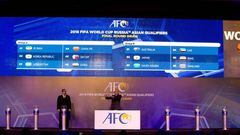 Asian Football Confederation (AFC) General Secretary Windsor John holds the country name card of Australia in the draw for 2018 FIFA World Cup Russia Asian qualifiers final round in Kuala Lumpur,