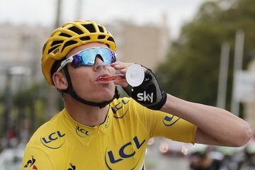 Christopher Froome of Great Britain, drinks champagne during the 21st and final stage of the Tour de France 2017 cycling race over 103Km between Montgeron and Paris Champs-Elysees, France, 23 July 2017.
