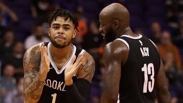 PHOENIX, AZ - NOVEMBER 06: D&#039;Angelo Russell #1 of the Brooklyn Nets reacts alongside Quincy Acy #13 during the second half of the NBA game against the Phoenix Suns at Talking Stick Resort Arena on November 6, 2017 in Phoenix, Arizona. The Nets defeat