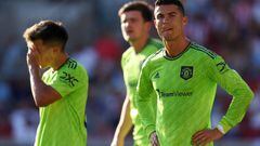 BRENTFORD, ENGLAND - AUGUST 13: Cristiano Ronaldo and Lisandro Martinez of Manchester United look dejected during the Premier League match between Brentford FC and Manchester United at Brentford Community Stadium on August 13, 2022 in Brentford, England. (Photo by Catherine Ivill/Getty Images)