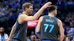 DALLAS, TEXAS - JANUARY 16: Dirk Nowitzki #41 of the Dallas Mavericks celebrates with Luka Doncic #77 of the Dallas Mavericks in the first half at American Airlines Center on January 16, 2019 in Dallas, Texas. NOTE TO USER: User expressly acknowledges and