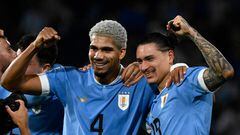 Uruguay's defender Ronald Araujo (L) and forward Darwin Nunez (R), the players who scored for Uruguay to defeat Argentina, pose for a picture after the end of the 2026 FIFA World Cup South American qualification football match between Argentina and Uruguay at La Bombonera stadium in Buenos Aires on November 16, 2023. (Photo by Luis ROBAYO / AFP)