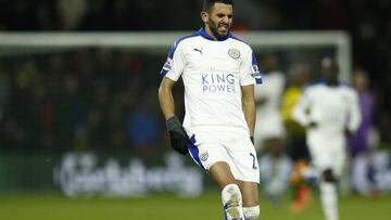 Leicester's Riyad Mahrez holds his leg