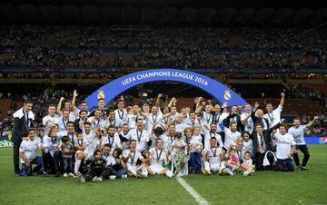 MILAN, ITALY - MAY 28: Real Madrid players pose with the Champions League trophy