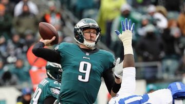 PHILADELPHIA, PA - DECEMBER 31: Quarterback Nick Foles #9 of the Philadelphia Eagles looks ot pass against defensive end Demarcus Lawrence #90 of the Dallas Cowboys during the first quarter of the game at Lincoln Financial Field on December 31, 2017 in Philadelphia, Pennsylvania.   Elsa/Getty Images/AFP == FOR NEWSPAPERS, INTERNET, TELCOS &amp; TELEVISION USE ONLY ==