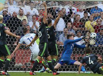 Jamie Vardy (second left) nets the equaliser for England.