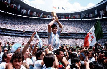 Maradona holds the World Cup aloft in 1986.