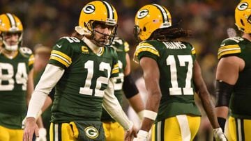 Jan 22, 2022; Green Bay, Wisconsin, USA; Green Bay Packers quarterback Aaron Rodgers (12) and wide receiver Davante Adams (17) in action against the San Francisco 49ers during a NFC Divisional playoff football game at Lambeau Field. Mandatory Credit: Jeff