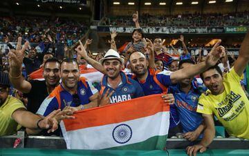 Indian fans watch during the third Twenty20 international cricket match between India and Australia in Sydney on January 31, 2016.