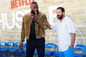 Cast members LeBron James and Adam Sandler attend a premiere for the film "Hustle" 