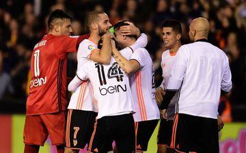 Valencia celebrate their win over Real Madrid
