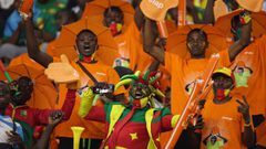 Cameroon supporters cheer ahead of the Africa Cup of Nations (CAN) 2021 round of 16 football match between Cameroon and Comoros at Stade d&#039;Olembe in Yaounde on January 24, 2022. (Photo by Kenzo Tribouillard / AFP)
